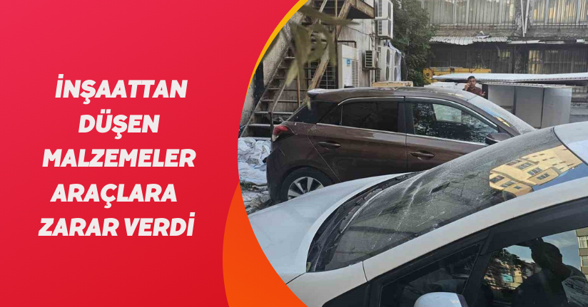 İnşaattan düşen malzemeler araçlara zarar verdi