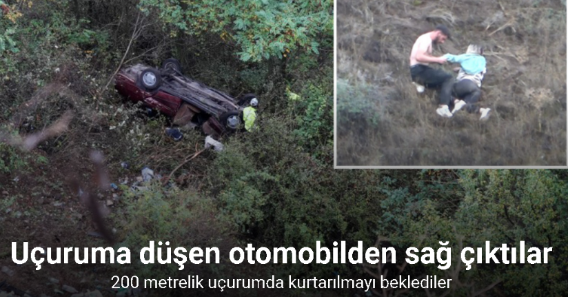 Uçuruma düşen otomobilden sağ çıktılar, 200 metrelik uçurumda kurtarılmayı beklediler