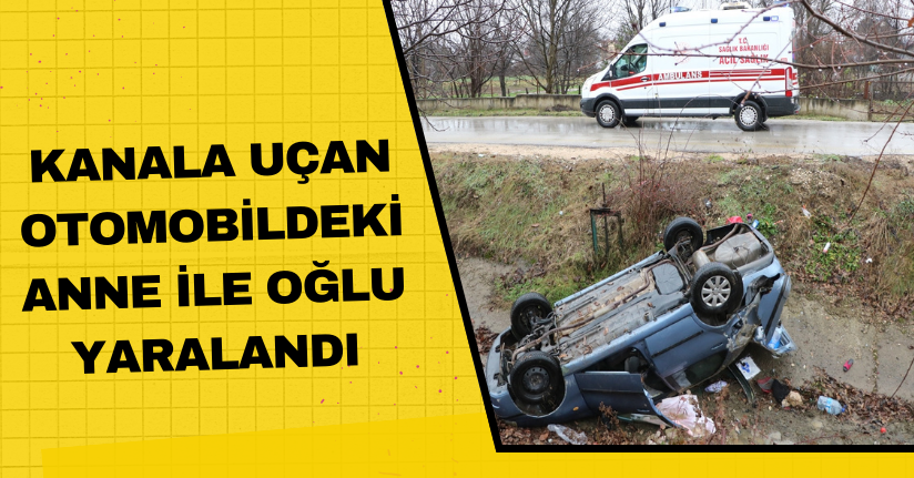 Kanala uçan otomobildeki anne ile oğlu yaralandı