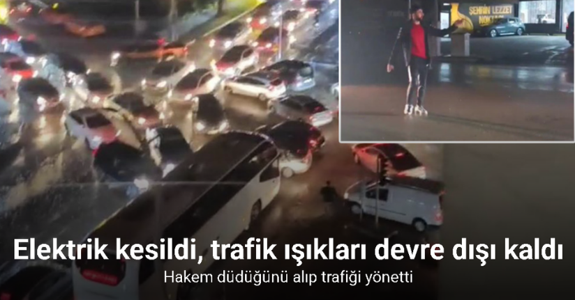 Elektrik kesintisinde hakem düdüğünü alıp trafiği yönetti