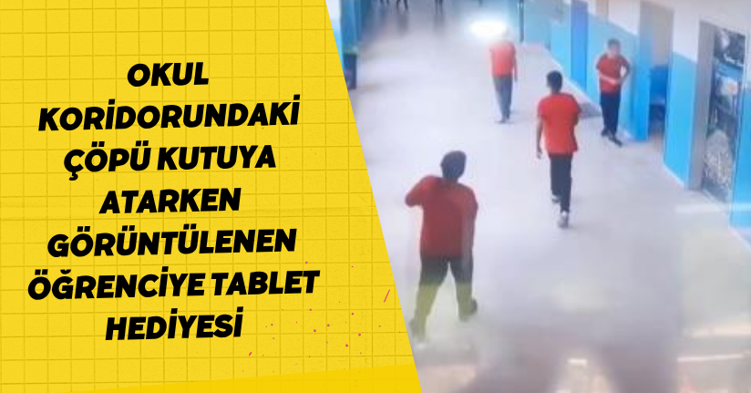 Okul koridorundaki çöpü kutuya atarken görüntülenen öğrenciye tablet hediyesi