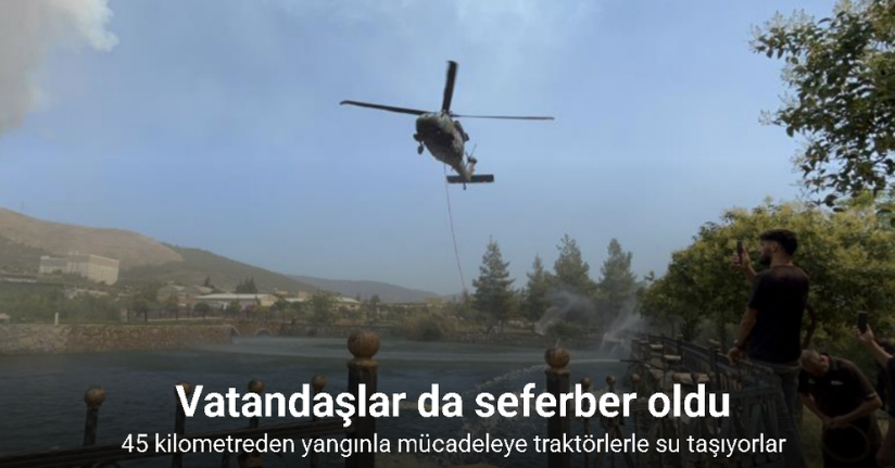 Vatandaşlar, 45 kilometreden yangınla mücadeleye traktörlerle su taşıyorlar