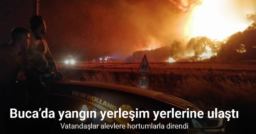 Buca’daki orman yangını yerleşim yerine ulaştı, vatandaşlar alevlere hortumlarla direndi