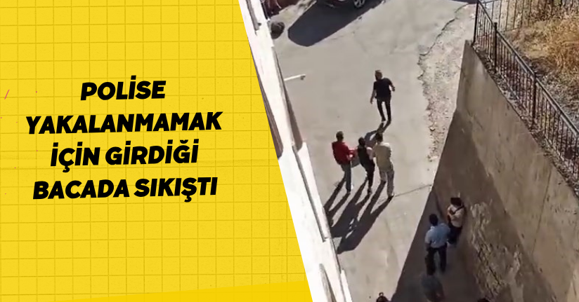 Polise yakalanmamak için girdiği bacada sıkıştı