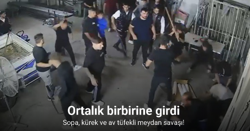 Sopa, kürek ve av tüfekli meydan savaşını andıran kavga kamerada