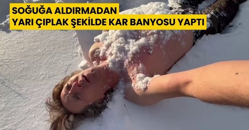 Soğuğa aldırmadan yarı çıplak şekilde kar banyosu yaptı