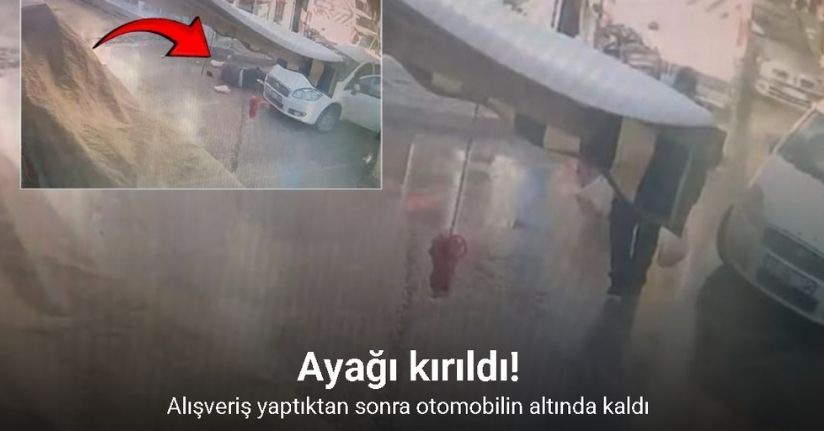 Alışveriş yaptıktan sonra otomobilin altında kaldı