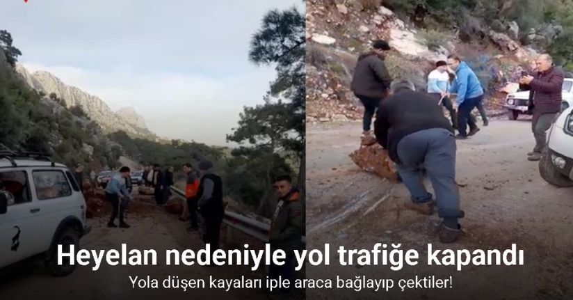 Yola düşen kayaları iple araca bağlayıp çektiler