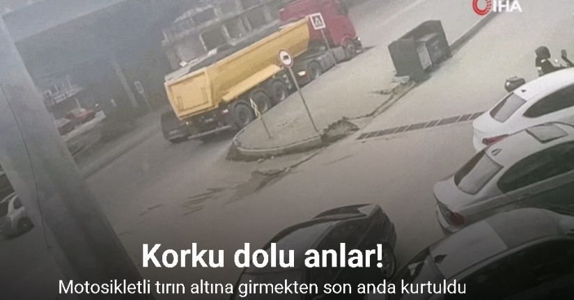 Motosikletli tırın altına girmekten son anda kurtuldu