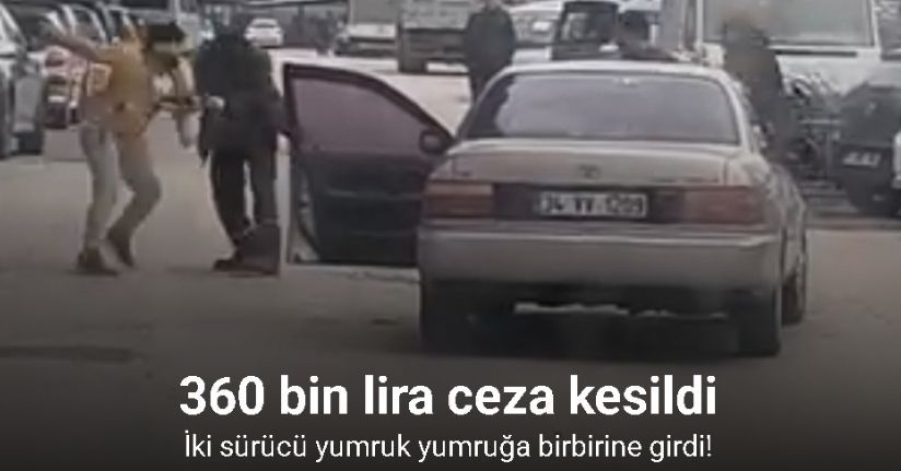 Yol ortasında yumruklu kavga kamerada
