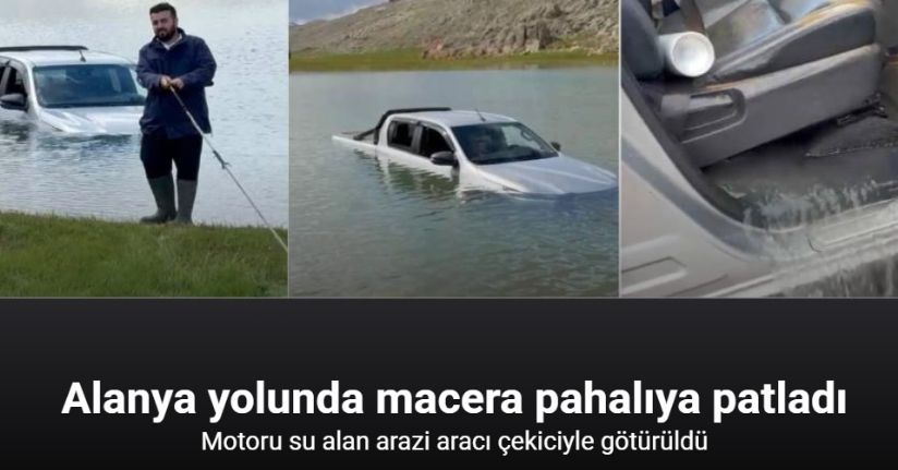 Göletten geçmek isterken aracıyla mahsur kaldı, yardımına arkadaşları yetişti