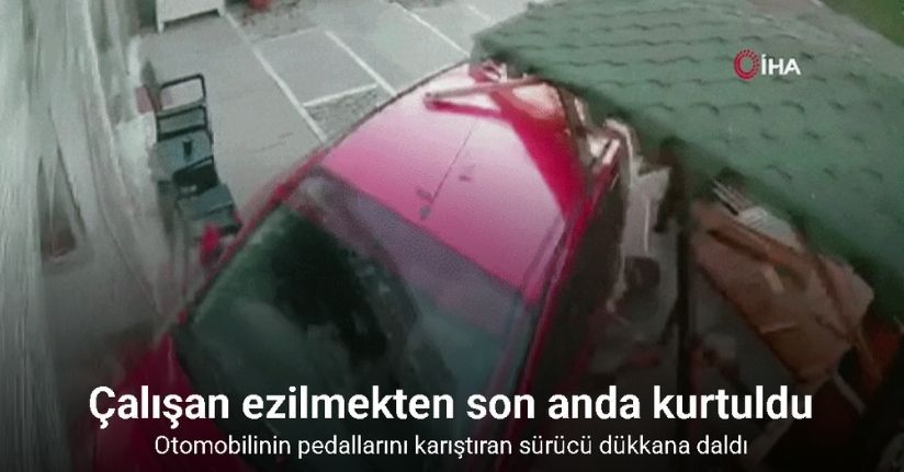 Otomobilinin pedallarını karıştıran sürücü dükkana daldı, içerdeki çalışan ezilmekten son anda kurtuldu