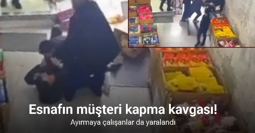 Komşu esnafın müşteri kapma kavgası kamerada